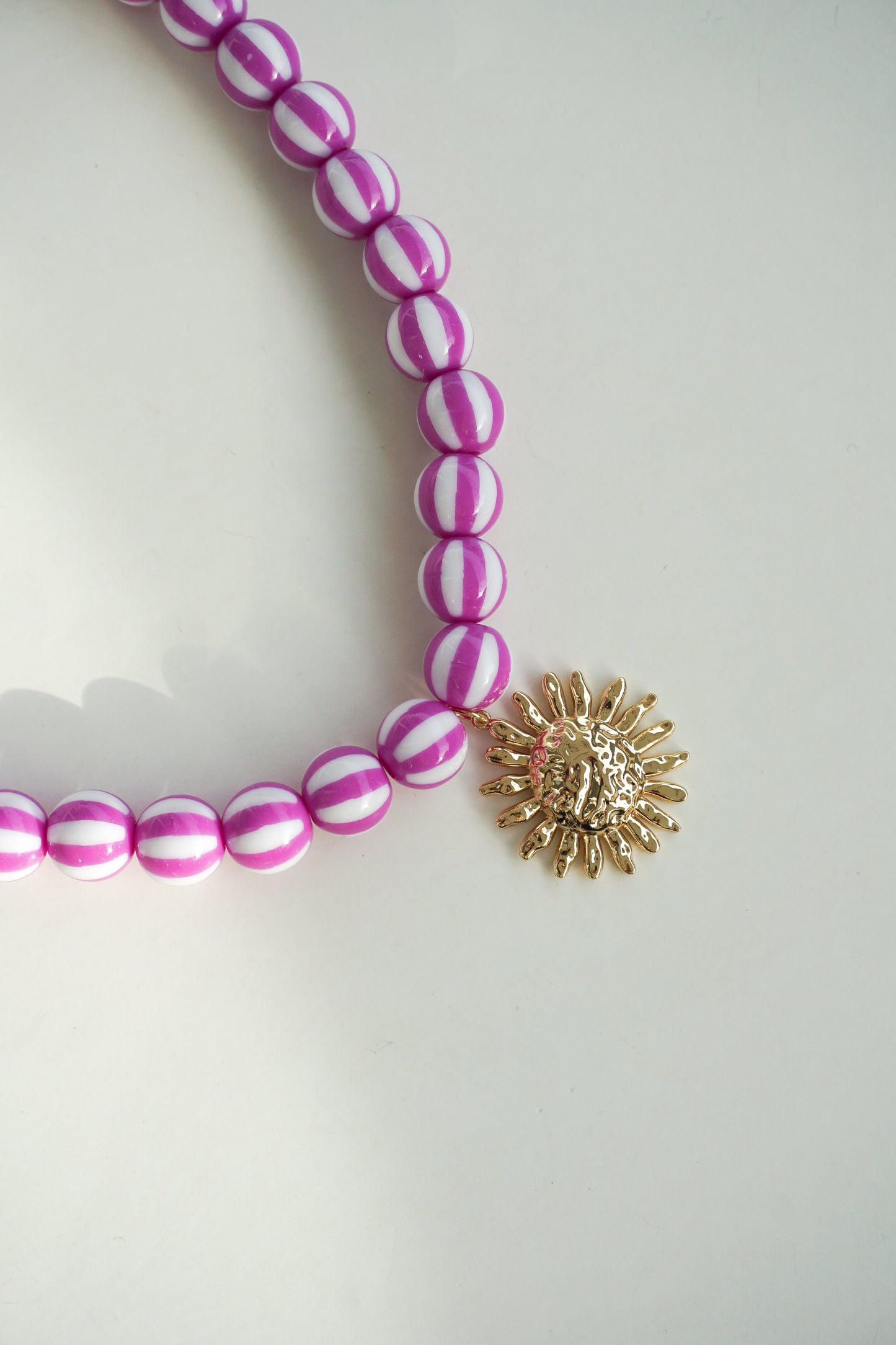 COLLAR SOL MAGENTA