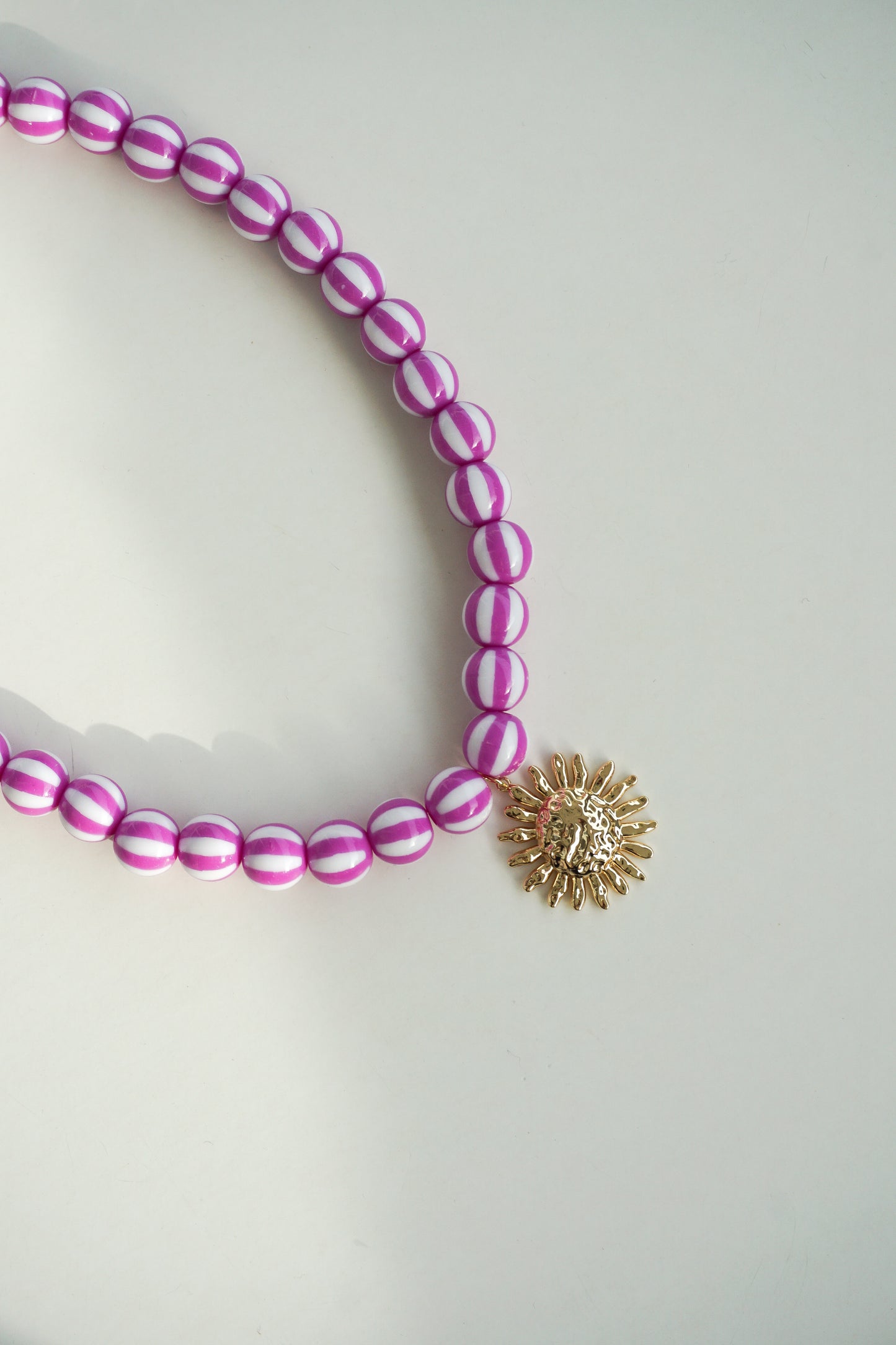 COLLAR SOL MAGENTA