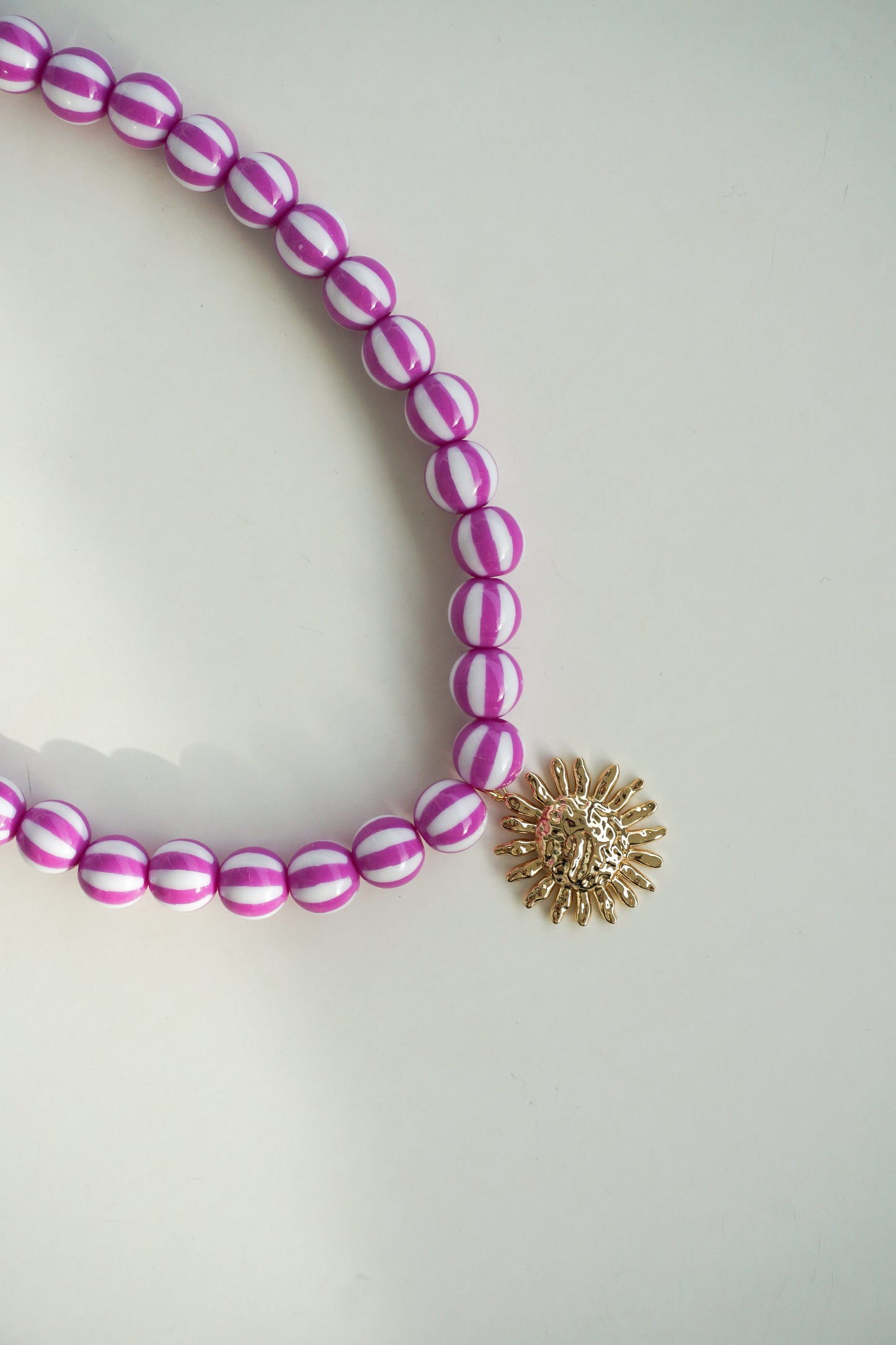 COLLAR SOL MAGENTA