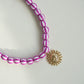 COLLAR SOL MAGENTA